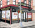 Illustrated digital print of The Spring Lounge bar at Spring and Mulberry in Manhattan by John Tebeau, featuring horseshoe bar, sidewalk windows, taxidermied sharks, and people-watching scene